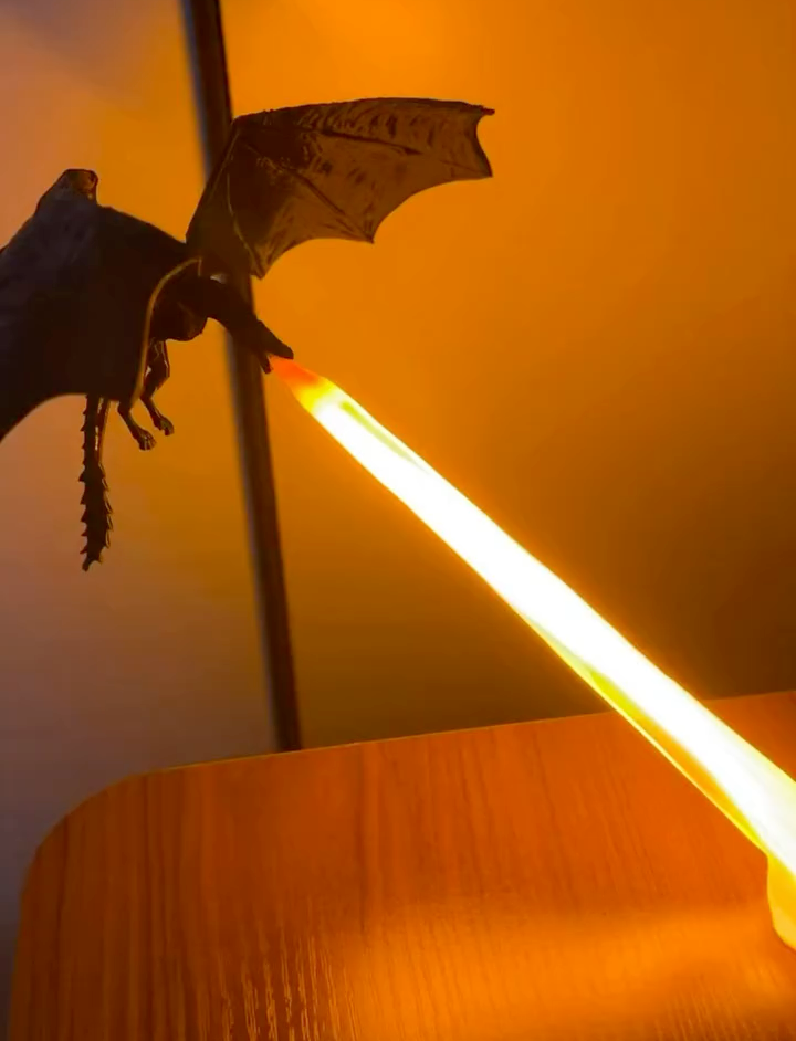 Dragon lamp breathing a beam of fire
